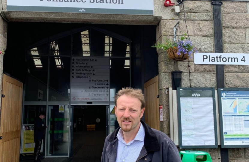 Derek Thomas MP campaigning for the ticket office in Penzance