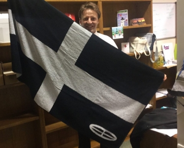 derek with a flag
